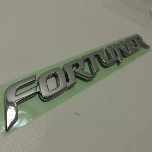 Emblema compuerta original para fortuner 06-11
