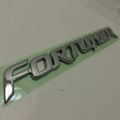 Emblema compuerta original para fortuner 06-11