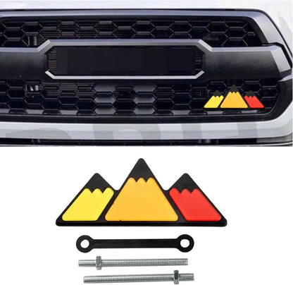 EMBLEMA MONTAÑA TRICOLOR TOYOTA TRD DE PARRILLA