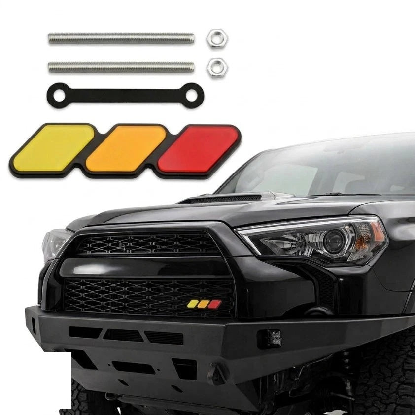EMBLEMA TRICOLOR TOYOTA TRD DE PARRILLA